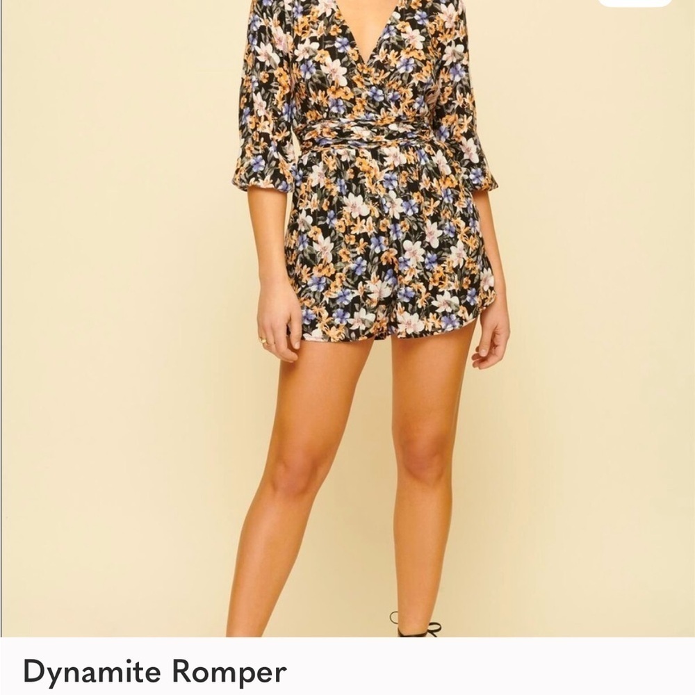 Dynamite Black and Floral Patterned long sleeve romper small